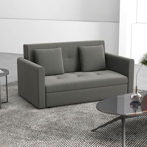 grey sofa in living room with glass coffee table