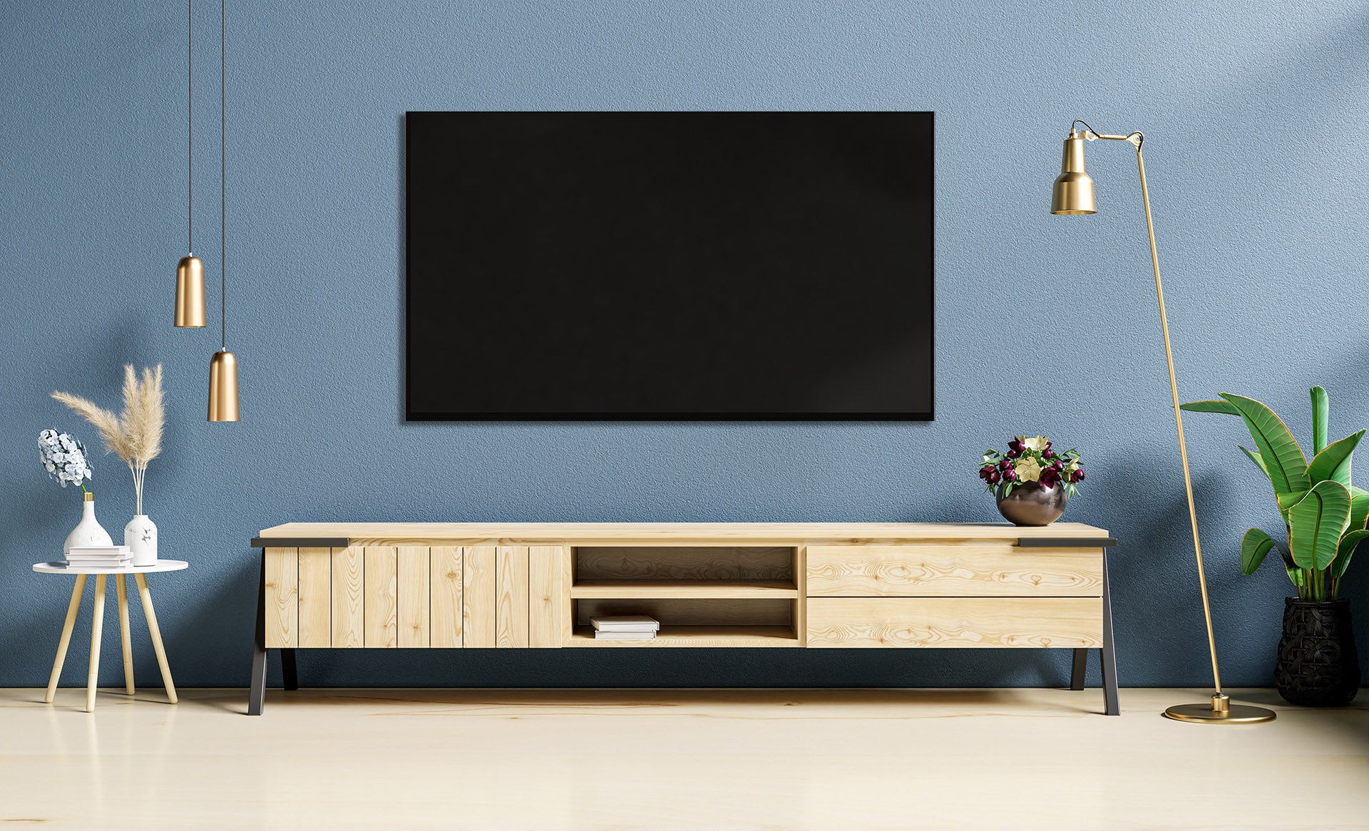 Wooden TV stand with large TV unit on wall above