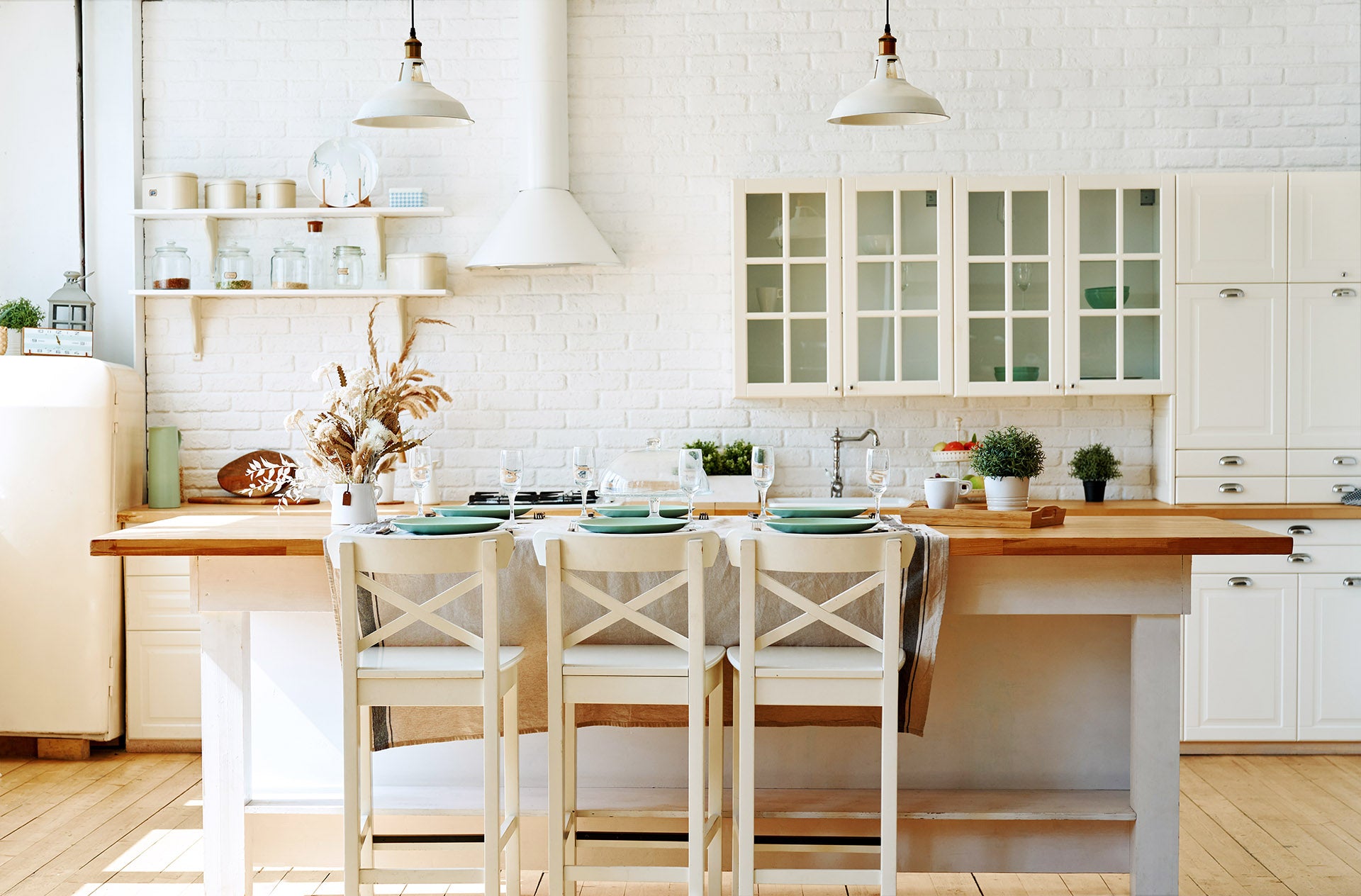 Wooden benches and stool in a rustic looking kitchen dining room